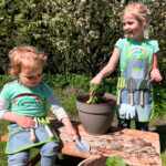 Childrens gardening apron with garden tools